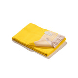 Reisedecke in schickem Design in leuchtendem gelb und beige aus Merino Wolle