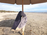 Reisedecke an Strand von Kiawah Island am Beach Club zum einkuscheln bei Wind