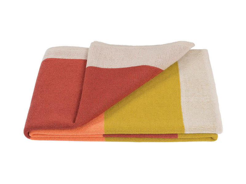 Mohairdecke mit leuchtenden Farben gestrickt aus Mohair und Merino als zeitloses Plaid und Wolldecke für ein lebendiges Interieur in luxuriösem Design und Nachhaltigkeit als das perfekte Geschenk für stilvolles Wohnen