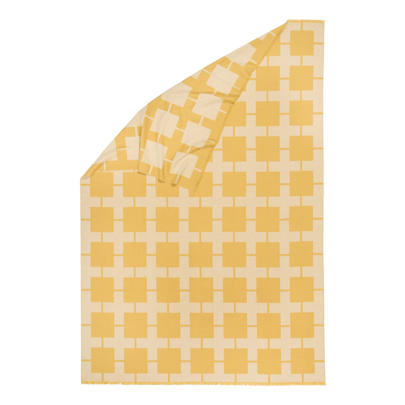 Wolldecke in gelb weiss Muster aus extra feinem Merino gewebt als zeitloses Plaid für ein lebendiges Interieur in luxuriösem Design und Nachhaltigkeit